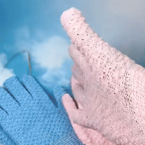 Exfoliating bath products including shower gloves and back scrub towel for deep cleansing and smooth skin.