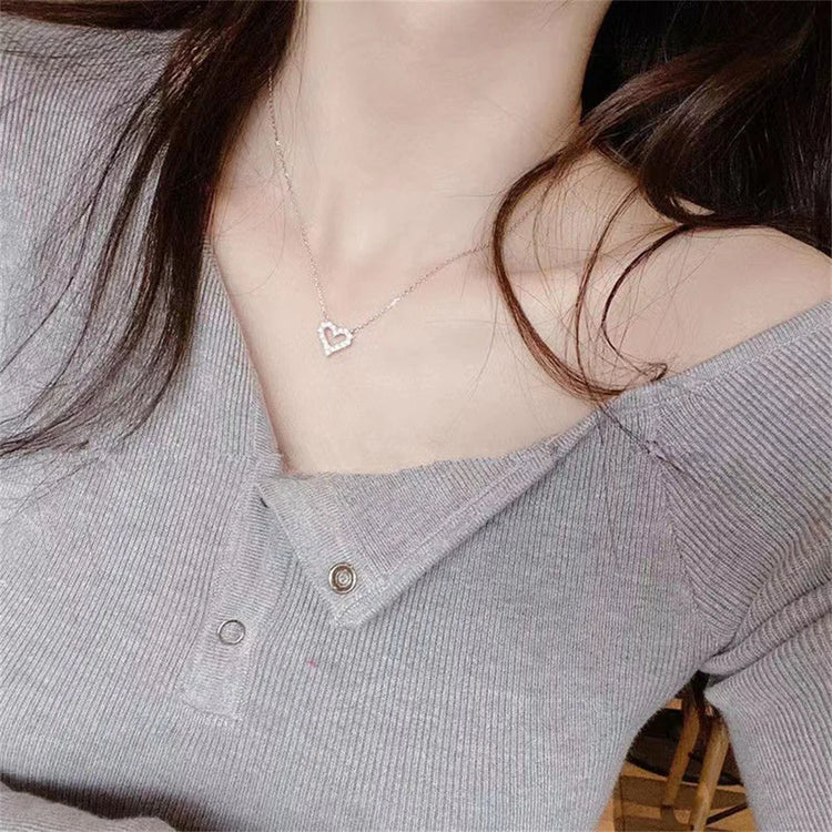 Crystal pendant necklace with romantic heart-shaped zircon design for women’s elegant and trendy fashion.