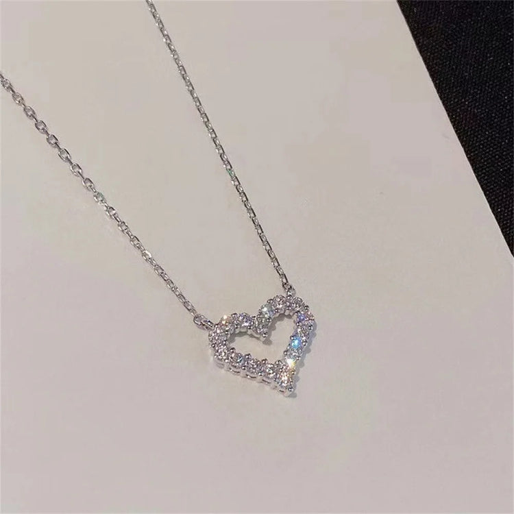 Crystal pendant necklace with romantic heart-shaped zircon design for women’s elegant and trendy fashion.