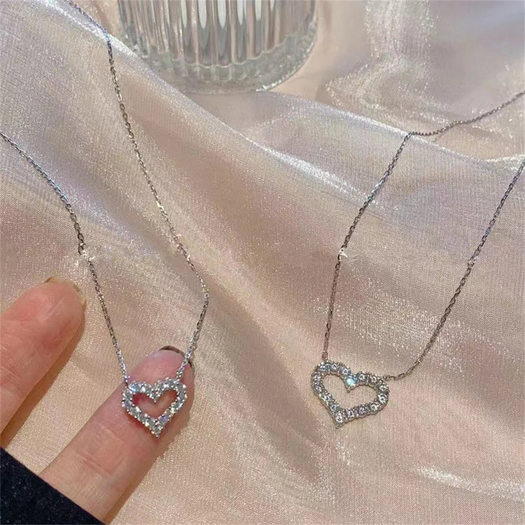 Crystal pendant necklace with romantic heart-shaped zircon design for women’s elegant and trendy fashion.