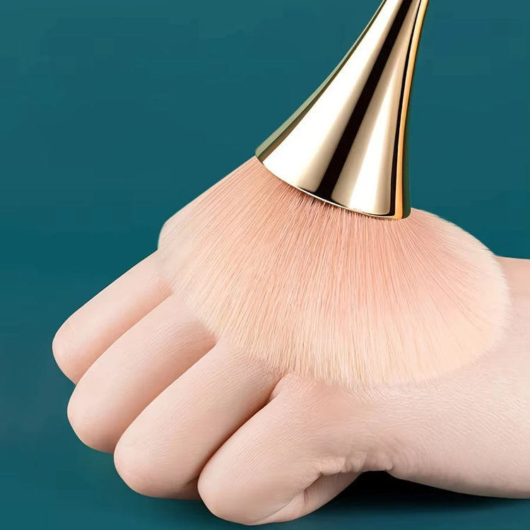 Fan makeup brush in makeup kit