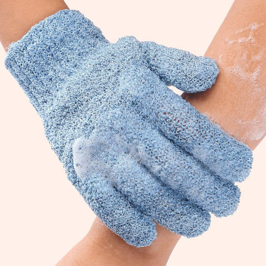 Exfoliating bath products including shower gloves and back scrub towel for deep cleansing and smooth skin.