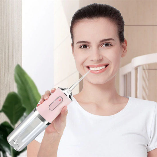 Portable Oral Irrigator Water Flosser with detachable tank and nozzles
