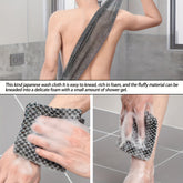 Back scrubber with sturdy strap handles for easy grip