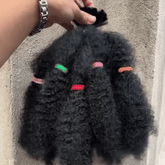 Woman with ombre 12 inch curly crochet hair extension