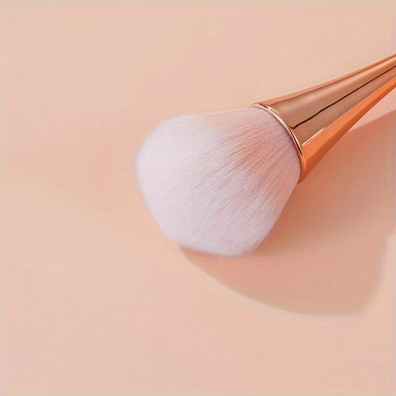 Fan makeup brush in makeup kit
