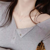 Crystal pendant necklace with romantic heart-shaped zircon design for women’s elegant and trendy fashion.