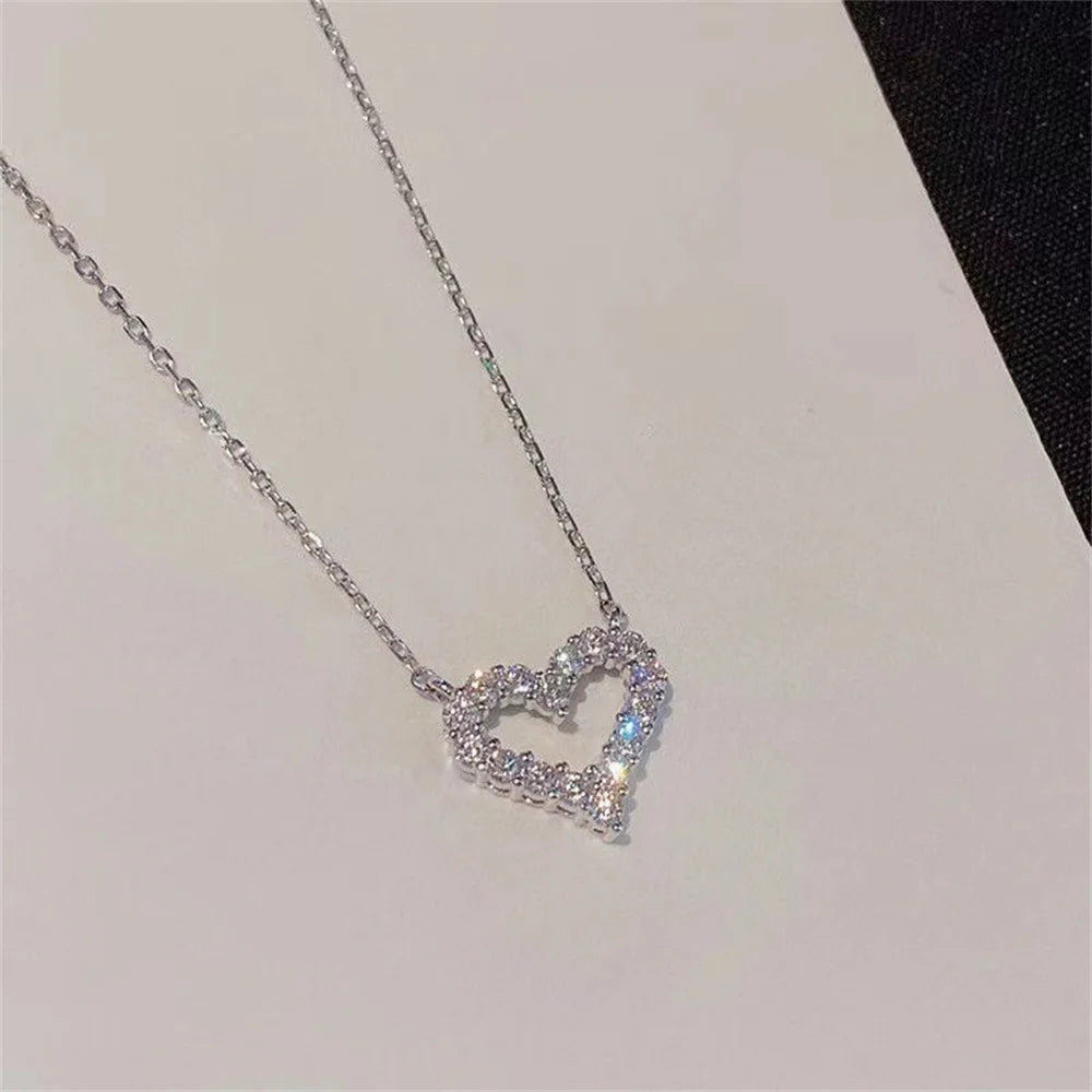 Crystal pendant necklace with romantic heart-shaped zircon design for women’s elegant and trendy fashion.