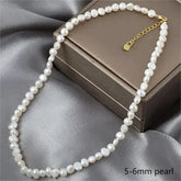 Real baroque pearl choker necklace on display