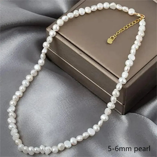 Real baroque pearl choker necklace on display