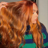 Long wavy black synthetic lace front wig shown on a mannequin