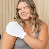 Before and after use of exfoliating glove on dry skin