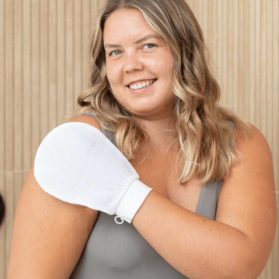 Before and after use of exfoliating glove on dry skin